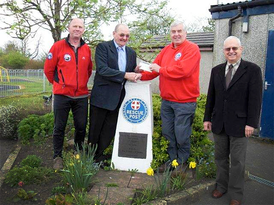 Cheque presented by Freemason Brian Bush to Buxton Mountain Rescue Team